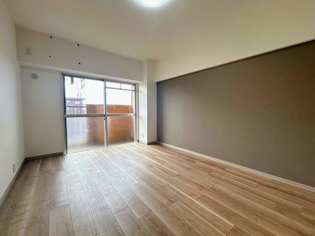 ニューコーポ港楽Ａ棟の洋室