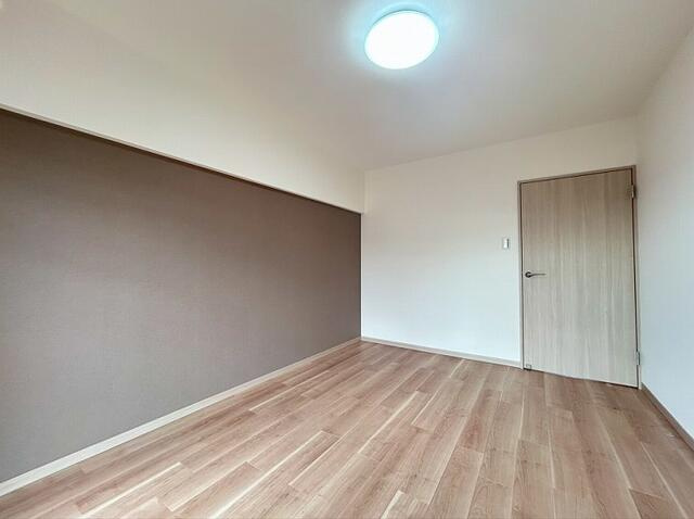 ニューコーポ港楽Ａ棟の洋室