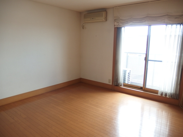 竜美西一戸建の洋室