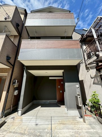 寝屋川市高宮栄町の外観|木造スレート葺3階建て
