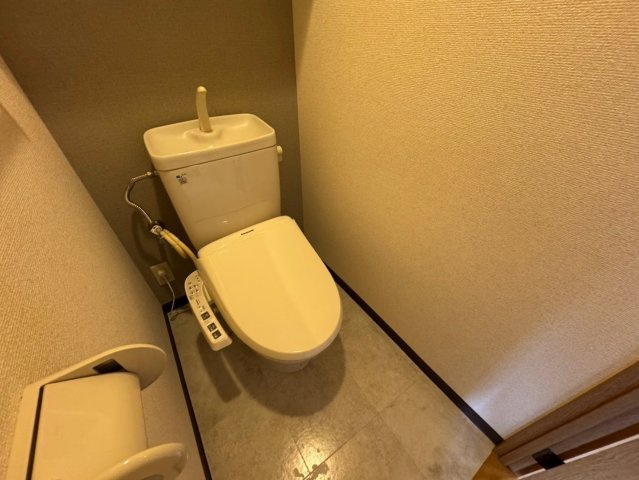 豊中市箕輪１丁目の賃貸マンションのトイレ