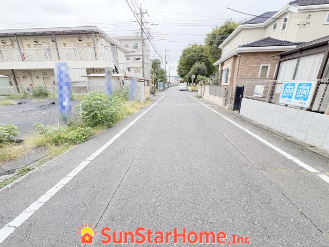 【サンスターホーム】青梅市河辺町6丁目　売地の前面道路含む現地写真
