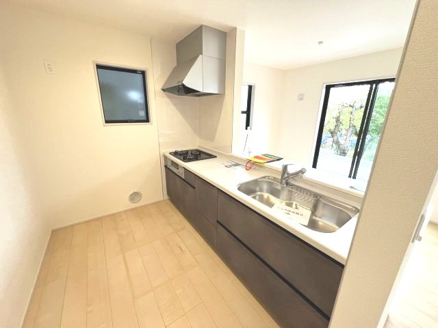 あきる野市五日市　新築戸建全4棟のキッチン|対面キッチンがご家族の温かい時間を演出