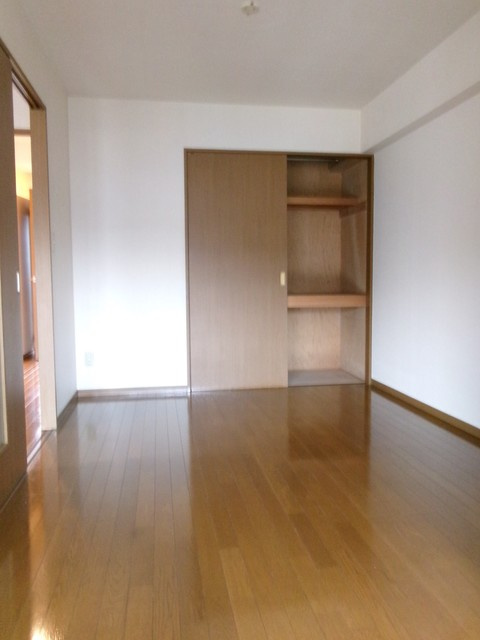 キャピタル高尾の寝室