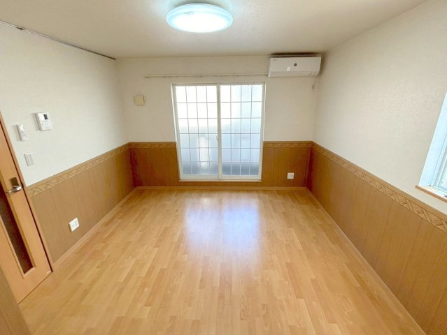 レジュールアッシュ三国本町の居間・リビング