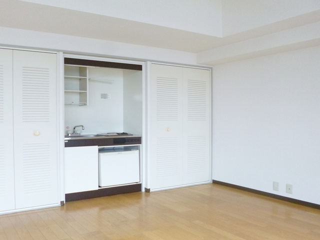 グローバリービューテラスⅣの洋室|キッチン周りはこんな感じです。