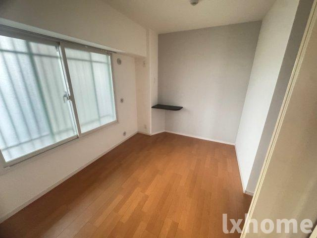 カルチェ茨木の寝室|落ち着いた色調の寝室です