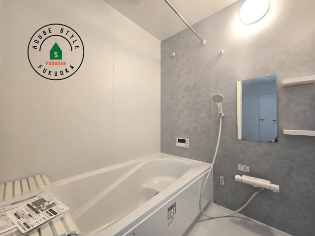 福津市福間南3丁目第4-1棟（1号棟）の内観：施工例|1日の疲れを癒してくれる広々バスルーム。雨の日のお洗濯にも大活躍な浴室乾燥機付です！