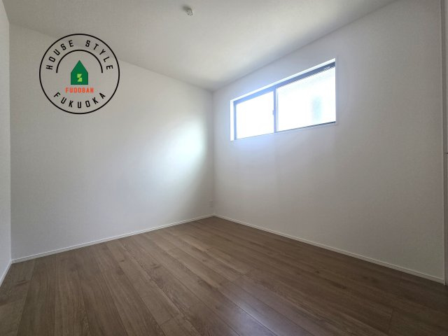 福津市福間南3丁目第4-1棟（1号棟）の内観：施工例|落ち着いた色調の洋室です。