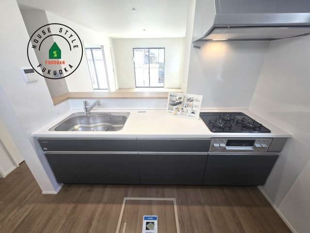 福津市福間南3丁目第4-1棟（1号棟）の内観：施工例|キッチン。グリル・食器洗い乾燥機・浄水器も完備。