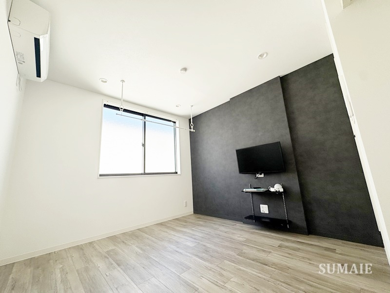 レピュア蓮根レジデンス　ＥＡＳＴの居間・リビング|洋室です