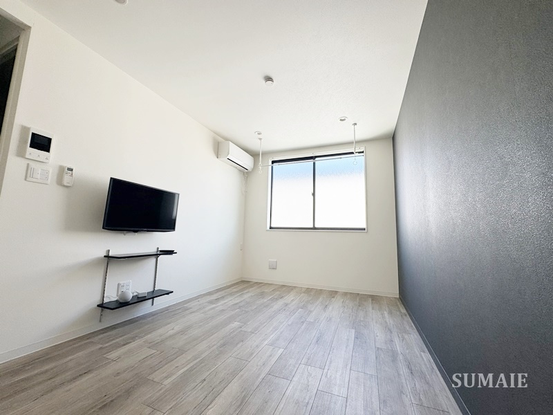 レピュア蓮根レジデンス　ＥＡＳＴの居間・リビング|洋室です