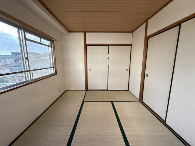 メゾン嵐山の寝室