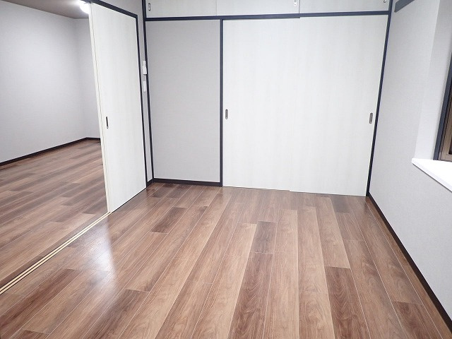 コンフォート春江B棟の洋室