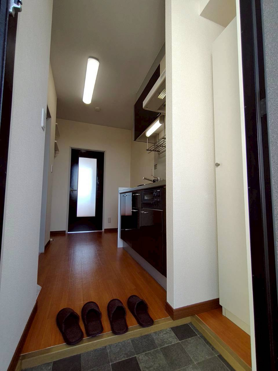 キャピタルつつじが丘B棟の玄関