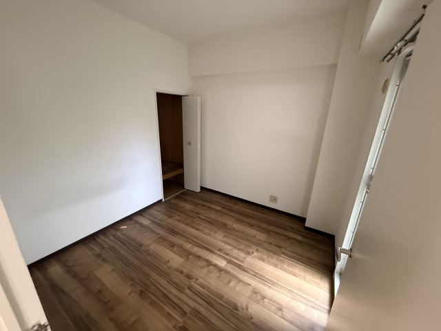 サンパレス21池田の寝室