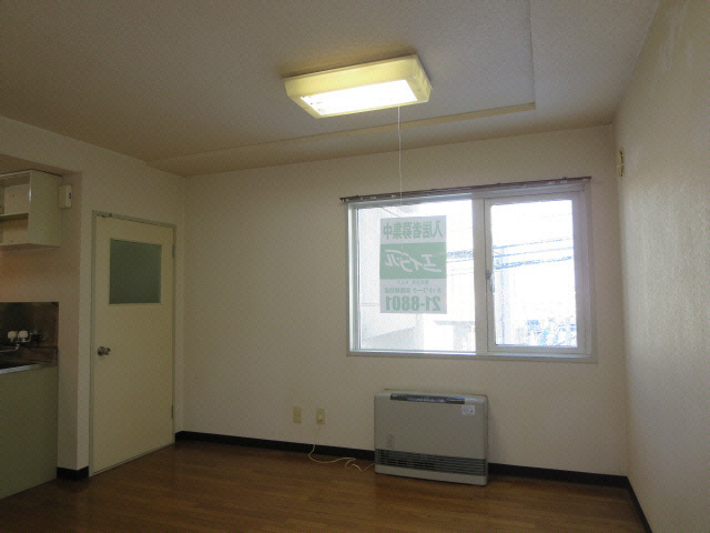 コスモスマンションの居間・リビング