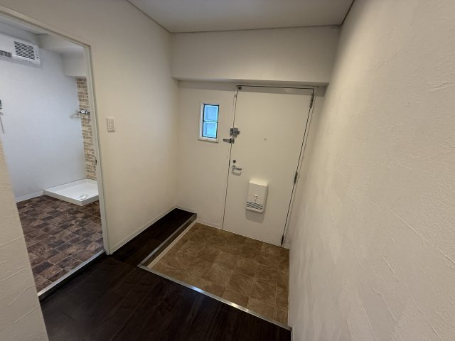 サンロイヤル池田駅前の玄関