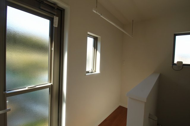 朝倉己　新築戸建　【2階リビング】のランドリースペース|2F　サンルーム　勝手口