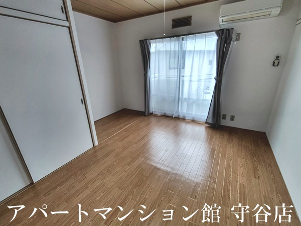 プルミエールエビハラ・パーソンズAの居間・リビング