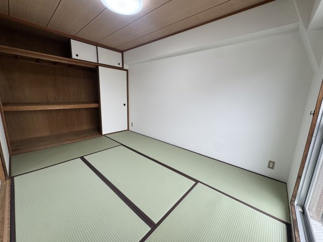 サンエクセル江井ヶ島の寝室