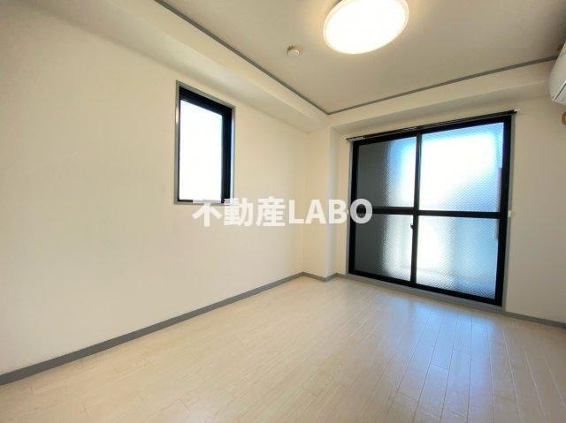 オーキッドコート田辺の寝室