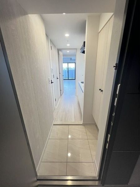 レジュールアッシュ塚本レジデンスの玄関