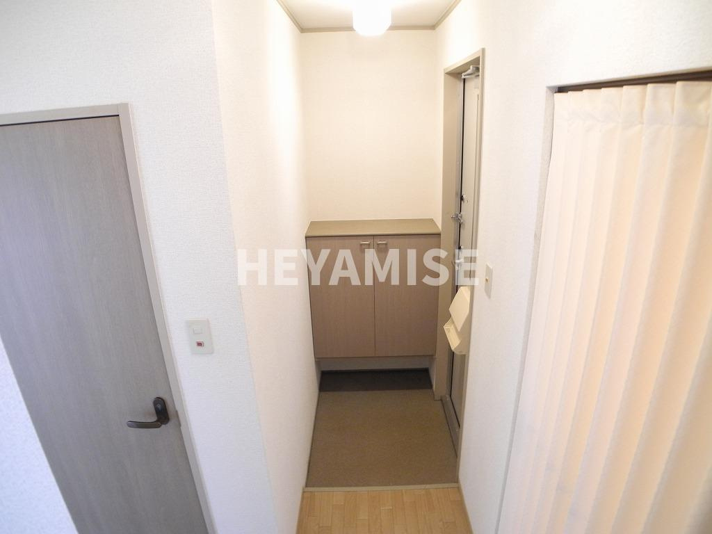 コンフォートたらみＢ棟の玄関