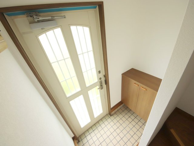 生駒市壱分町のテラスの玄関