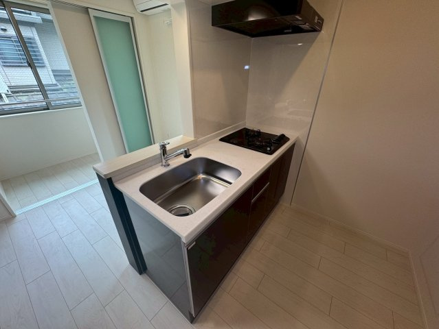 調布市富士見町４丁目のアパートのキッチン