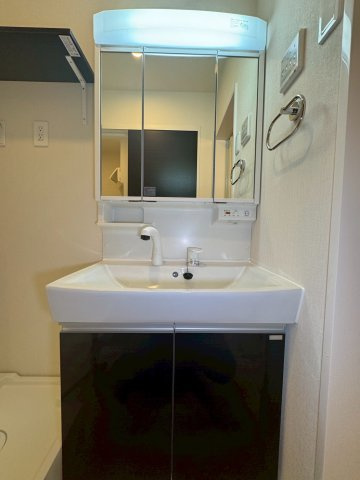 調布市富士見町４丁目のアパートの洗面所