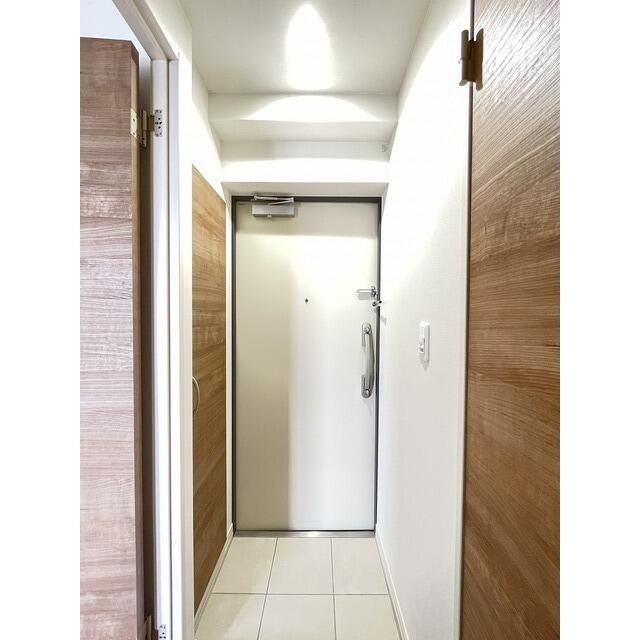 アルファコート西川口２７の玄関