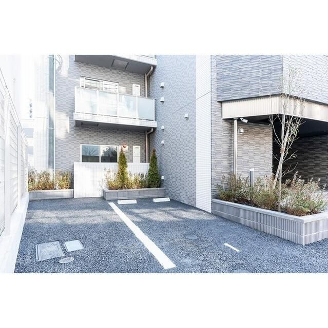 アルファコート町屋の駐車場