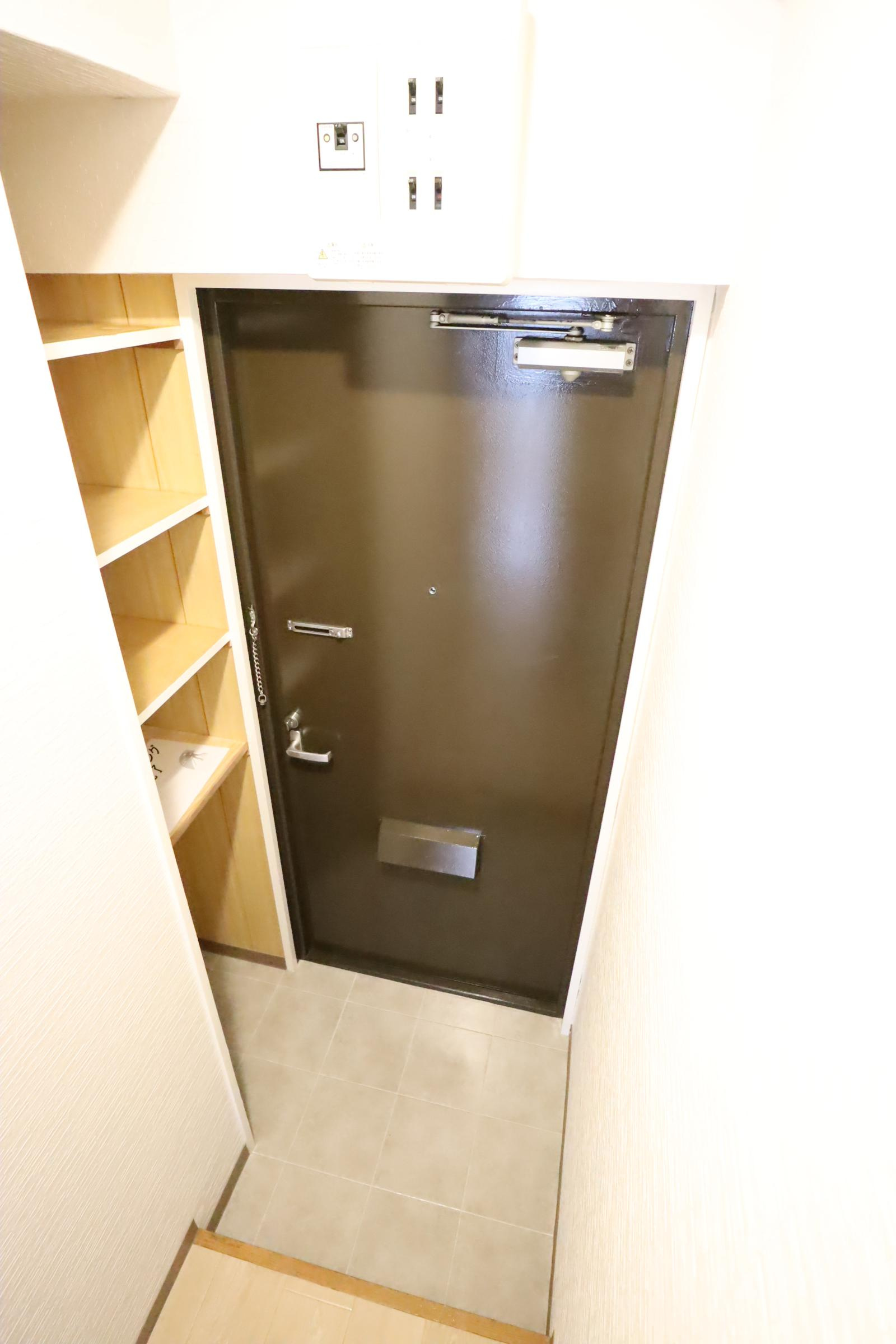 大阪市都島区都島南通２丁目の賃貸マンションの玄関