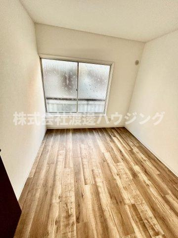 田川北2丁目テラスハウスの洋室