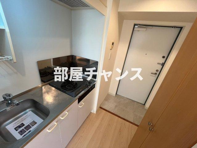 レジデンス金山スクエアの玄関