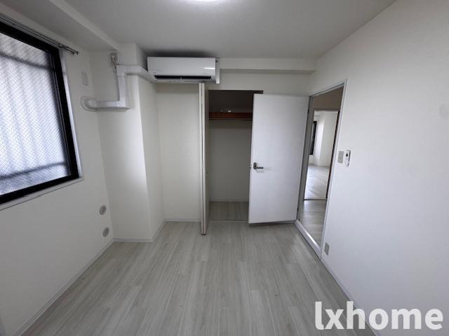 ロイヤル南茨木の寝室|ゆとりの広さです