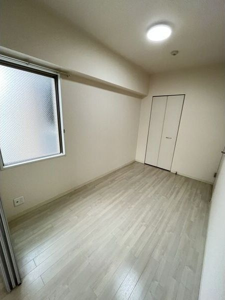 海老江サンライズの寝室