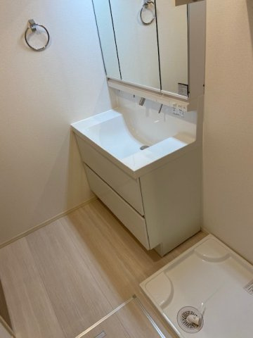 ベルプラージュ魚住の洗面所