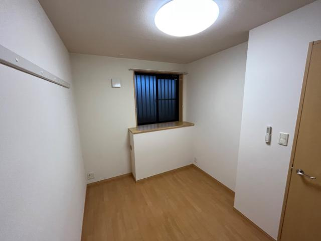 グリーンハイムＥの寝室|リビング