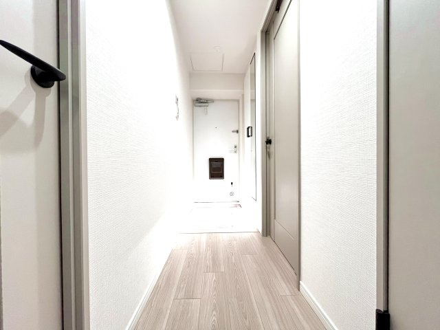 コスモ町屋の玄関