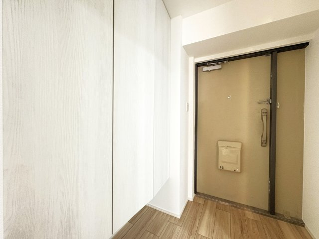 西新井大師扇スカイハイツの玄関