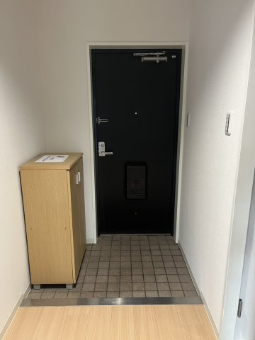 神戸市北区有野中町４丁目のマンションの玄関