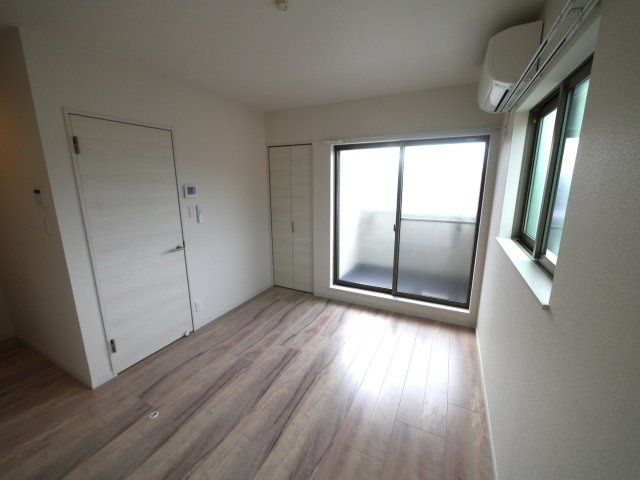 イルミエール千早南の居間・リビング