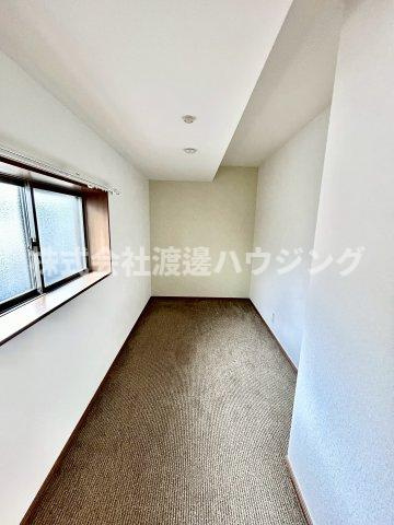 安立2丁目テラスハウスの洋室