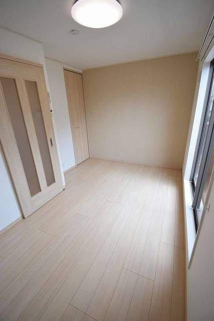 シンティラーレ小松島の寝室