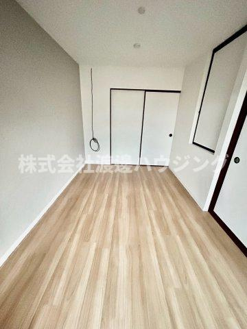 加美北6丁目テラスハウスの寝室