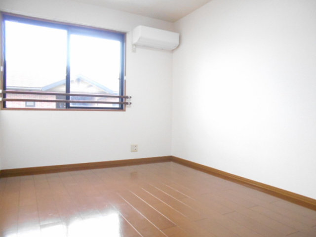 ファミーユつくば ＡＢＣの寝室