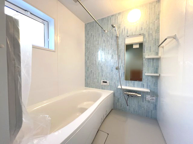 あきる野市引田　新築戸建全7棟の浴室|優しい色合いのパネルでゆったりとしたバスタイムが過ごせそうです♪