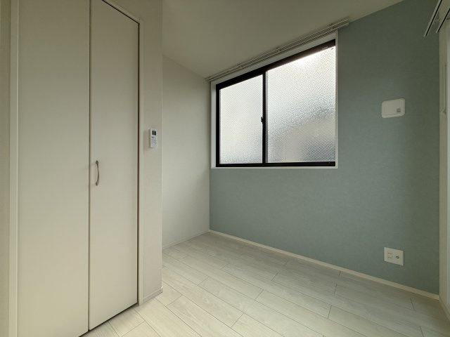 ハーモニーテラス遠里小野Ⅲの寝室